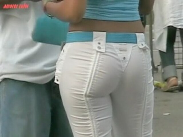The charming bimbo in the denim hot pants of the white color was spied in the streets free nude pictures