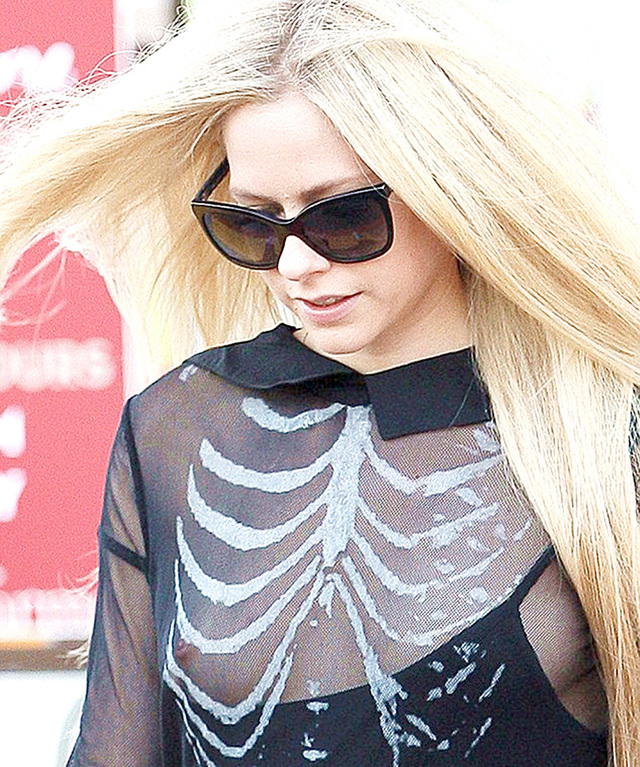 Avril Lavigne Boob Slip in Skeleton Dress free nude pictures
