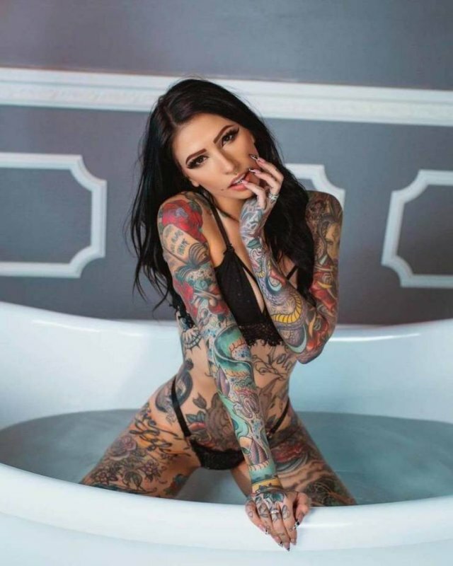 Attractive Tattooed Girl free nude pictures