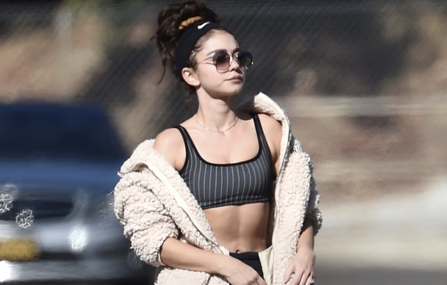 Sarah Hyland is Abs-olutely Sexy in Sports Bra and Fur Coat free nude pictures