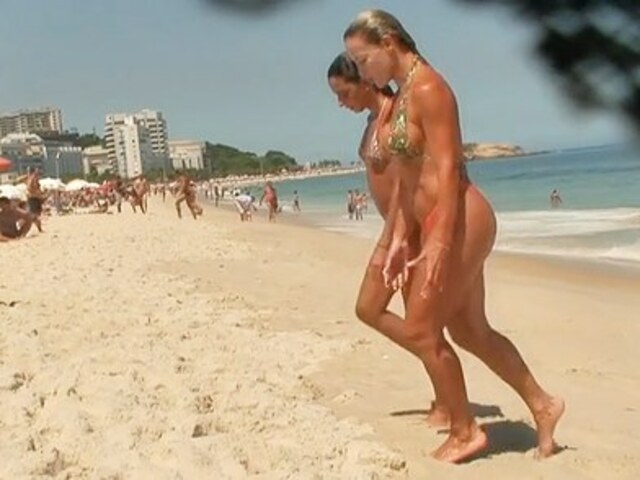 Sexy babes in tiny bikinis get spied on hidden camera when walking out of the warm sea free nude pictures