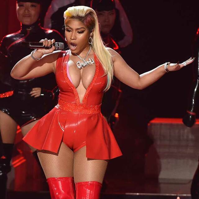 Nicki Minaj Serious Cameltoe in Red Latex @ Babe Stare