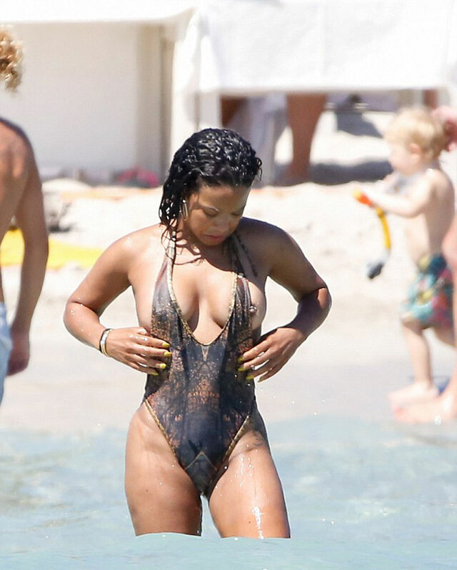 Christina Milian Nipple Slip in the Surf free nude pictures