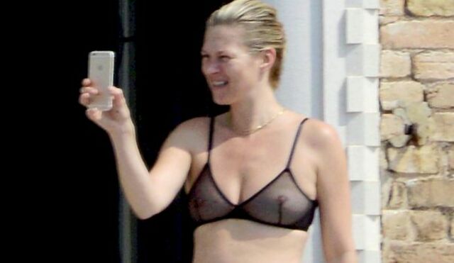 Kate Moss in a See Through Bra on a Balcony! free nude pictures